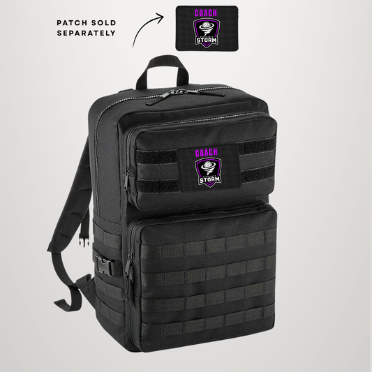 A black tactical backpack with MOLLE webbing and a front zip pocket, shown on a light gray background. A small inset at the top right shows a separate embroidered patch with the text 'COACH STORM' and a storm cloud graphic.
