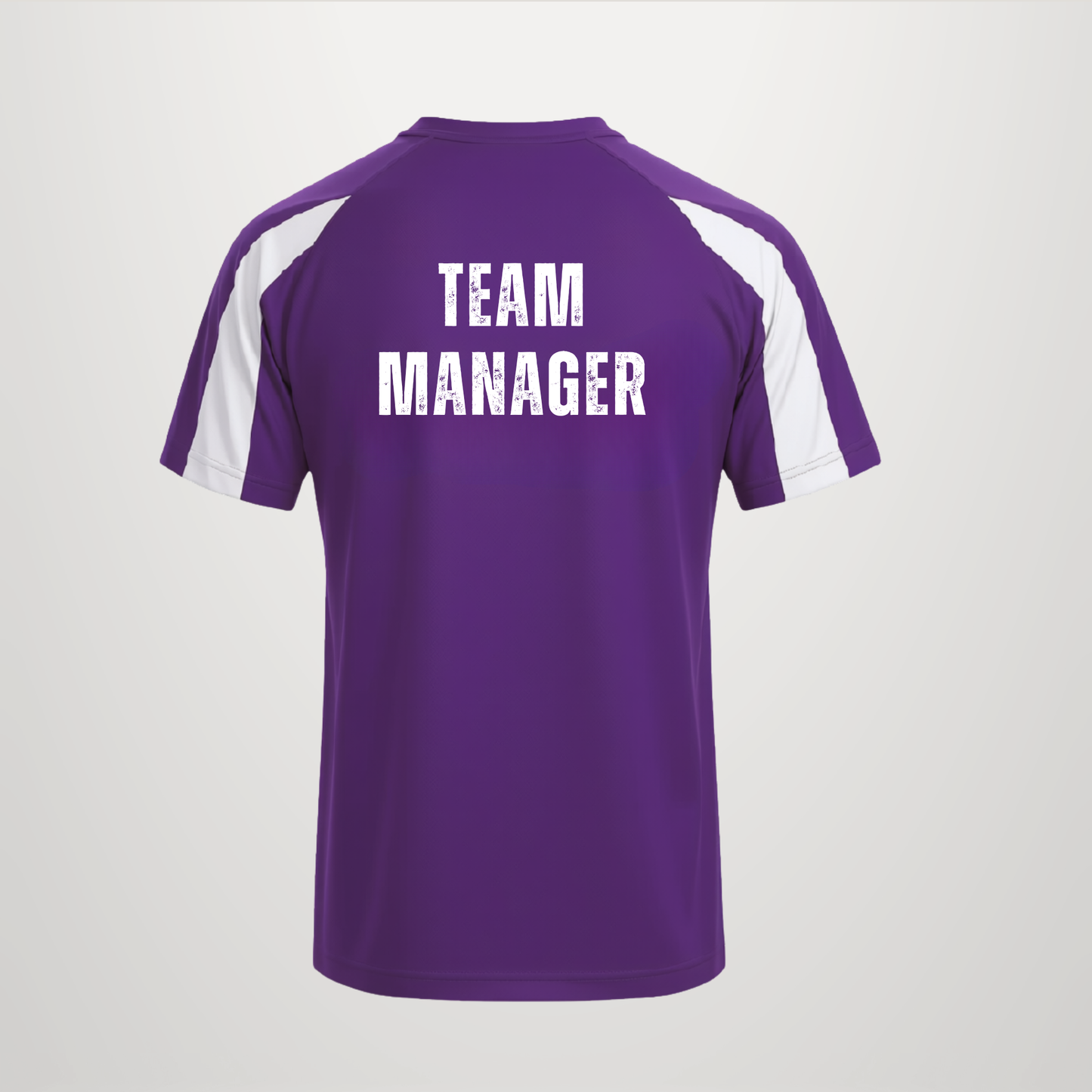 A purple short-sleeve athletic shirt shown from the back, featuring white shoulder panels and the words 'TEAM MANAGER' printed in bold white capital letters across the upper back.