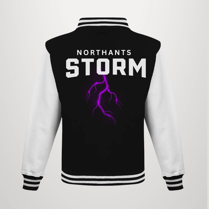 A black and white varsity jacket shown from the back, featuring the text 'NORTHANTS STORM' in white and a purple lightning bolt graphic.