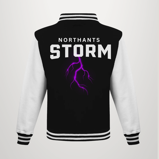 A black and white varsity jacket shown from the back, featuring the text 'NORTHANTS STORM' in white and a purple lightning bolt graphic.